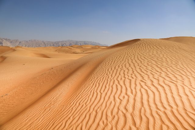 Representative photo of desert & dunes in the UAE, not Al Ajīj