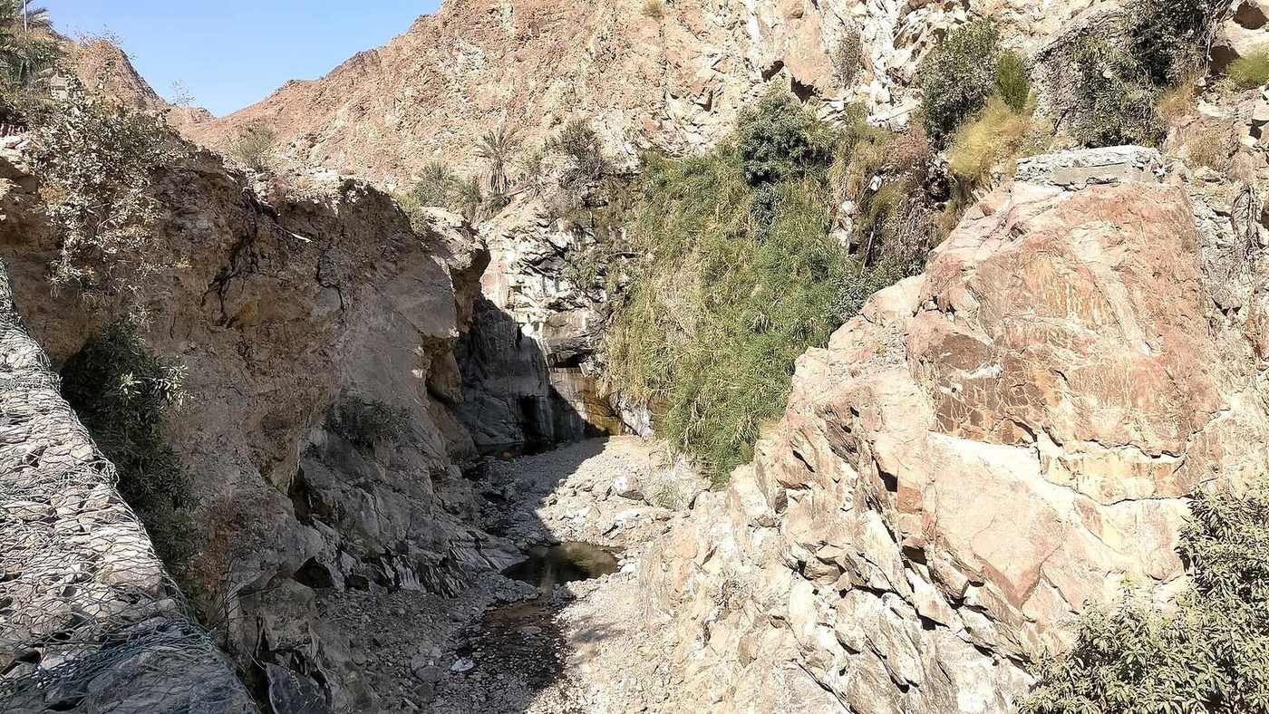 Wadi Shis — Small waterfall of Wadi Shis, also known as Wadi Ash Shis as it passes through the town of Shis, in the Emirate of Sharjah.jpg